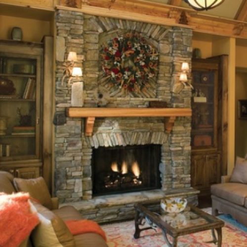 stone fireplace with wreath